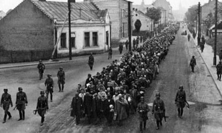 Jews being marched off to forced labor